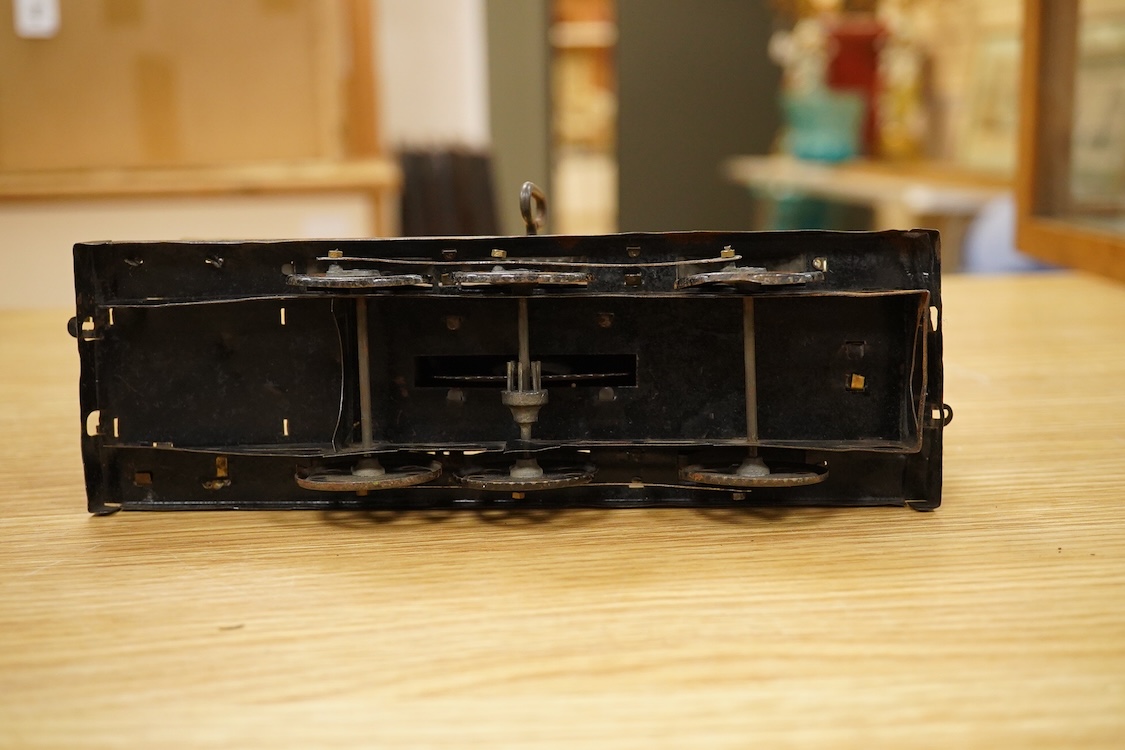 Seven Gauge One coarse scale railway freight wagons, by Bassett-Lowke, etc., including tinplate and wooden examples in liveries for LNWR, Midland Railway, and LBSCR, together with the remains of a scarce late 19th centur